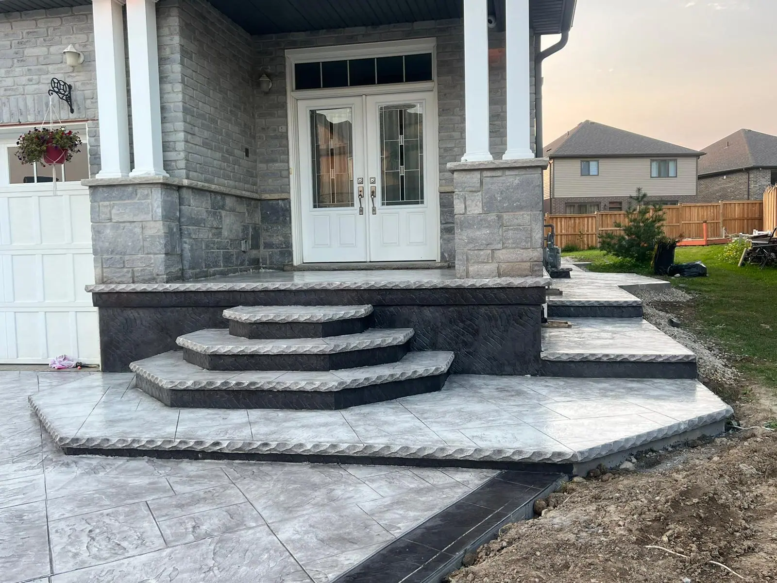 Stamped concrete steps and porch at a front entrance