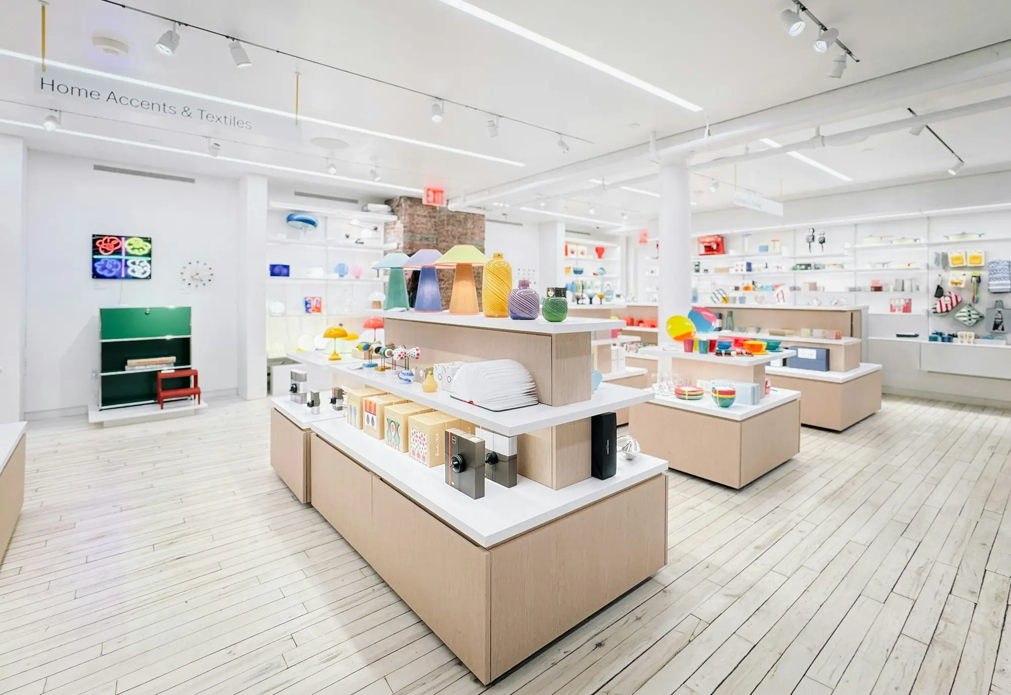 Retail store interior with display tables and track lighting